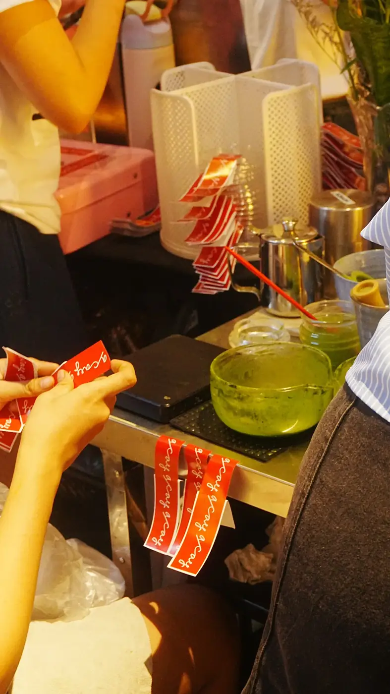 Close-up of a branded vendor booth at a Cabana Club pop-up